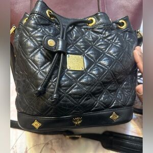 MCM Quilted Leather Black Crossbody Bucket Bag this bag is vintage.
